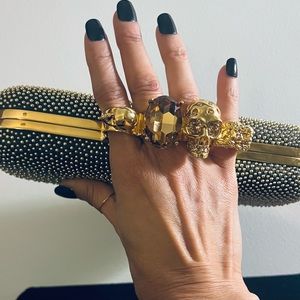 Alexander McQueen four ring studded clutch